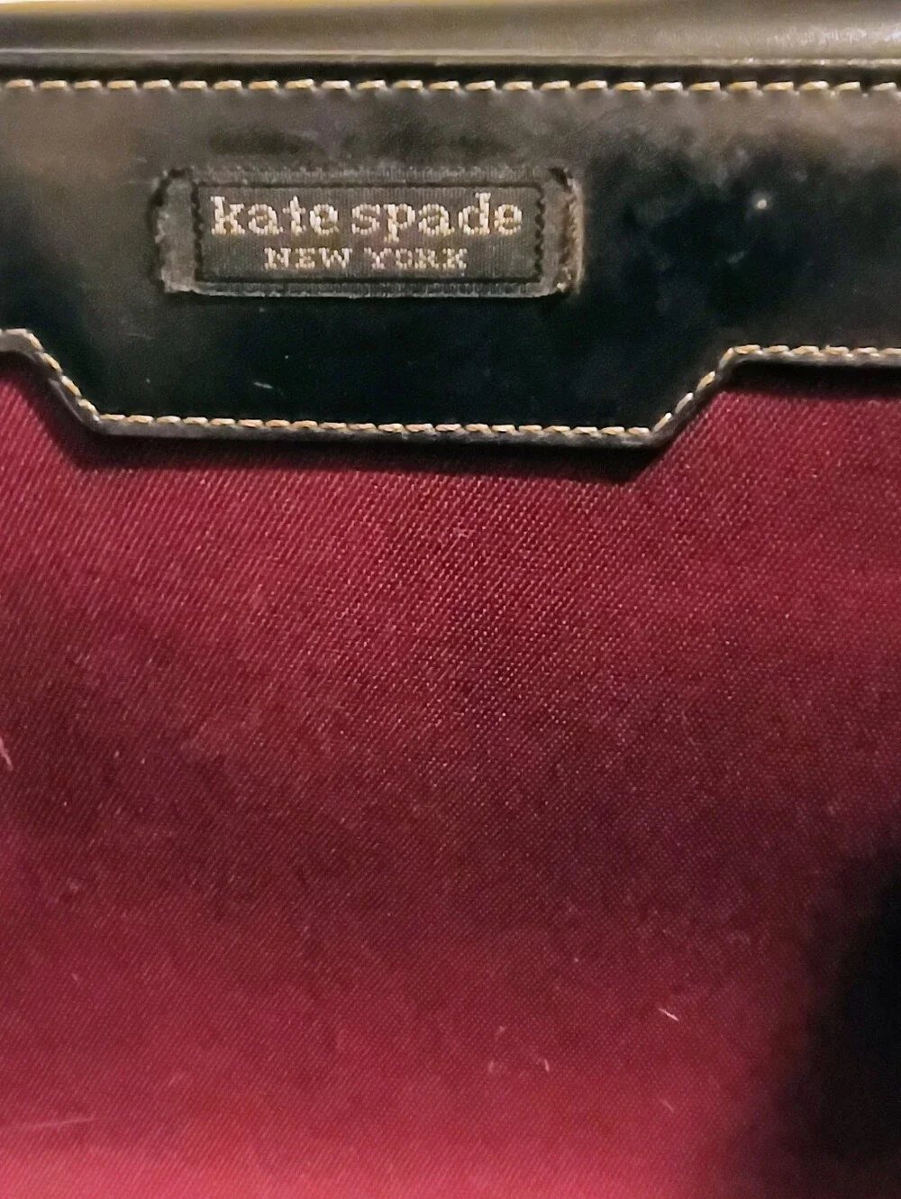 kate spade burgundy shoulder bag with black trim